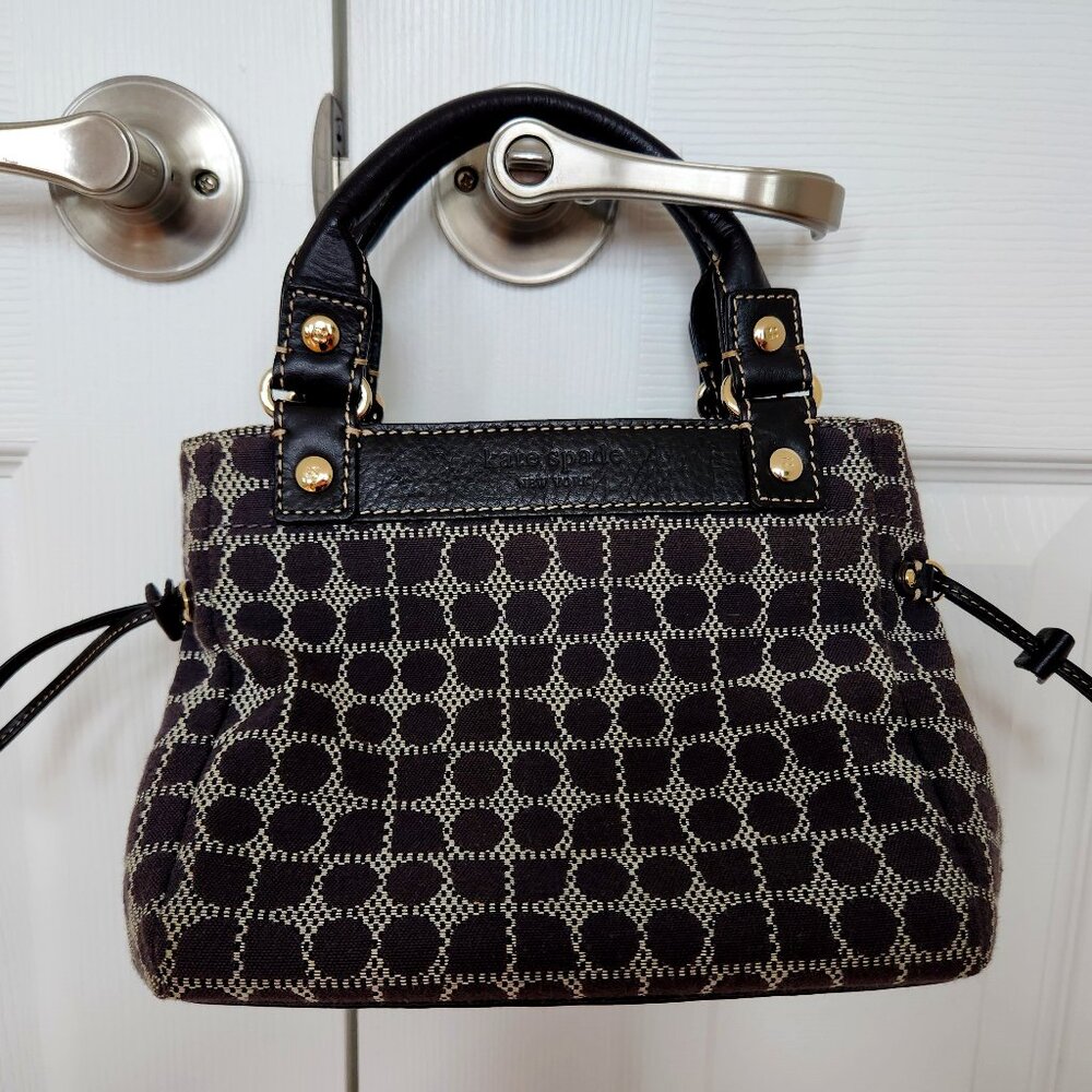 KATE SPADE NEW YORK DOT NOEL SMALL  LEATHER AND FABRIC HAND BAG.